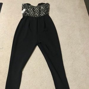 NWT Black and gold jumpsuit.